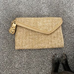 Gold convertible Henri bendel clutch